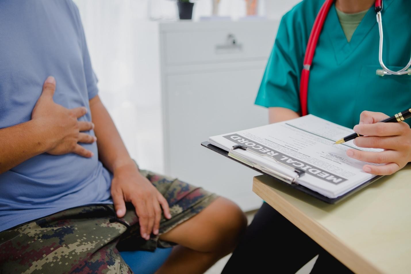 Patient arranging hernia consultation and treatment planning in Singapore with Dr Aaron Poh